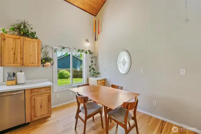 Wood vaulted ceilings and lovely cabinetry bring the charm!