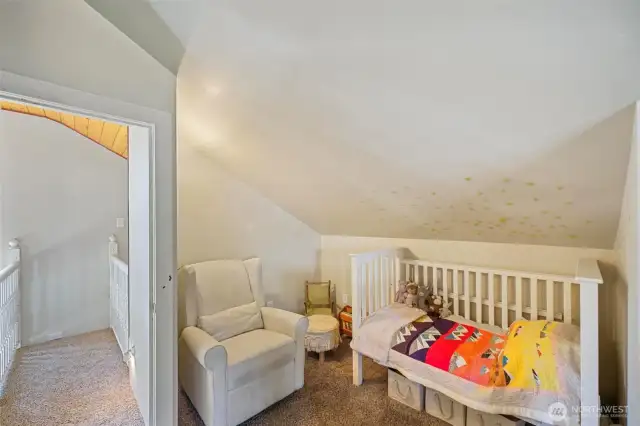 Primary bedroom nook provides ample extra space.