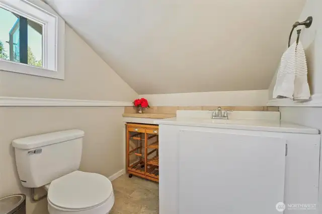 Half bathroom in the primary bedroom.