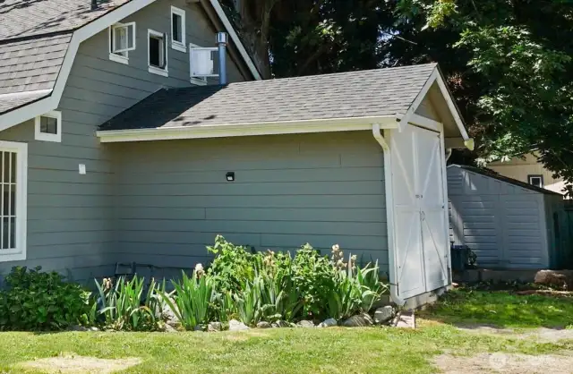 The shed provides a huge storage opportunity.  There is a cellar below with power and water.