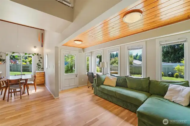 High ceilings and lots of windows allow for natural light to shine in.  Open concept living and dining areas.
