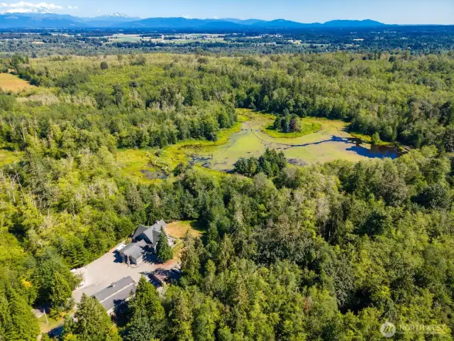There are four parcels making about 70 acres and the potential to build another residence or two and possibly 4 detached ADU's.