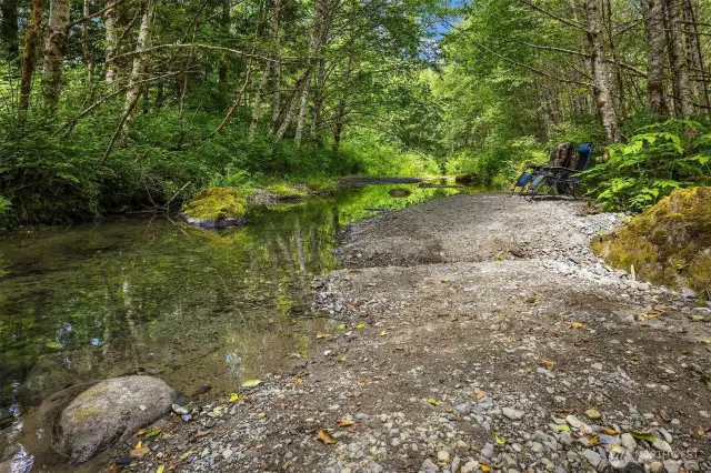 The creek running through the back of the property