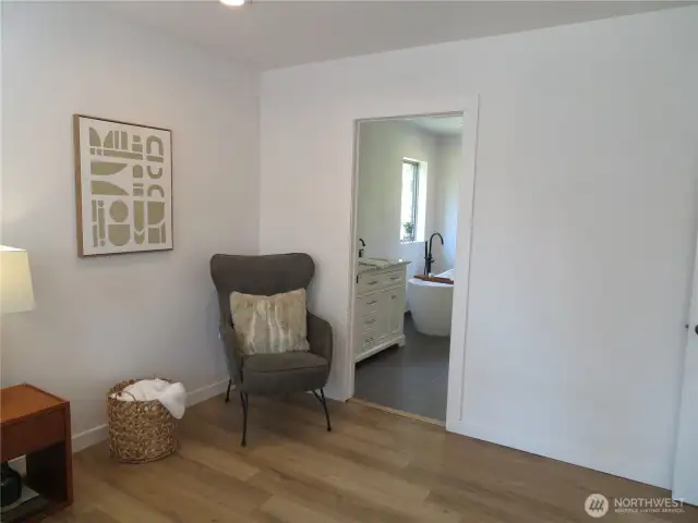 From the primary bedroom into the primary bath.