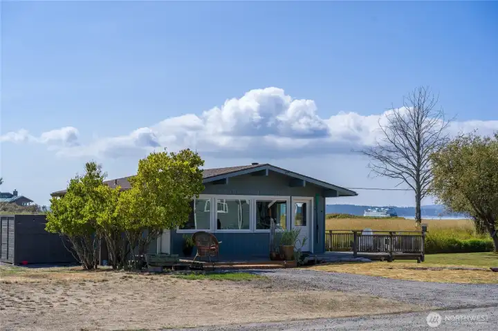 Sweet 2 bedroom, 3/4 bath cottage with lots of light and easy living.