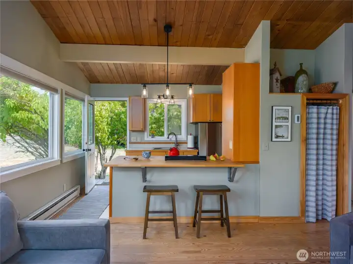 Sit at the bar and keep your eye on what's happening in the kitchen.