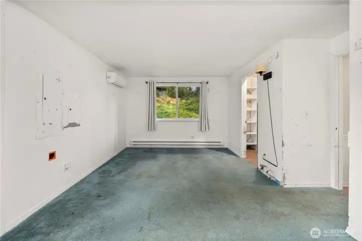 Primary suite has a walk-in-closet and private bathroom.