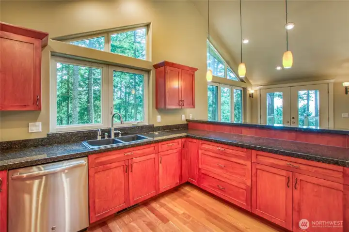 Kitchen with lots of windows and light.