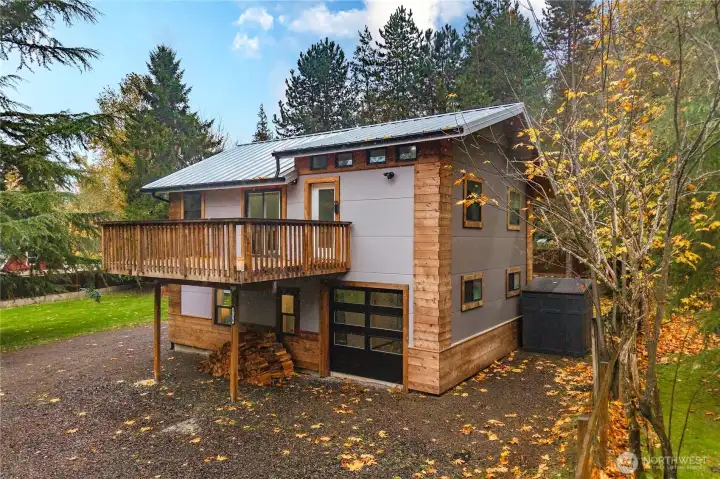 Location, location! Picture this: a beautifully  designed two-story modern home built in 2020  using commercial fabrication, including Centurious  insulated metal siding and cedar trim. Combine that  with all the best in current home features, set on a  spacious, level lot surrounded by nature. With two  offices (one in the home, one detached), you can  work from home full time—or a few days each week—  while less than 30 minutes from kayaking, paddle  boarding, biking/hiking/training, and skiing. This  home is the best of both worlds: stylish features for  today’s lifestyles, and outdoor adventures close by!