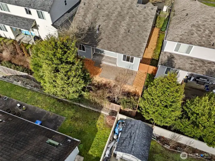 This aerial view puts the lifestyle into perspective. The clearly defined lot lines show a manageable footprint that keeps outdoor maintenance minimal, without giving up intentional spaces to enjoy. There’s room to relax, entertain, and personalize without signing up for endless yard work. It’s a smart balance that lets you enjoy the outdoors on your terms, not your weekends.