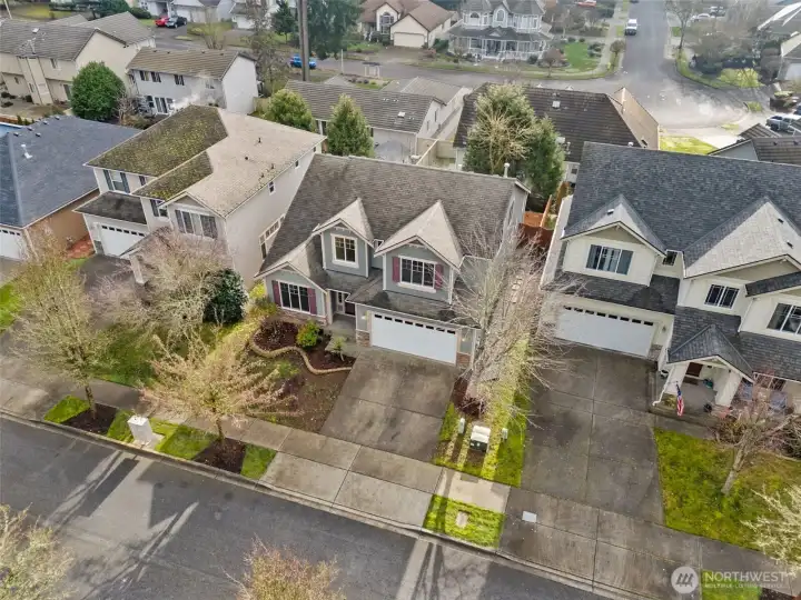 This aerial view gives a clear sense of how well the home is set up. The two car garage is more than just storage, with a finished and painted interior that feels clean and usable. The gas furnace and water heater are both located in the garage, keeping systems accessible and out of the living space. It’s a practical setup that makes maintenance straightforward and day to day life a little easier.