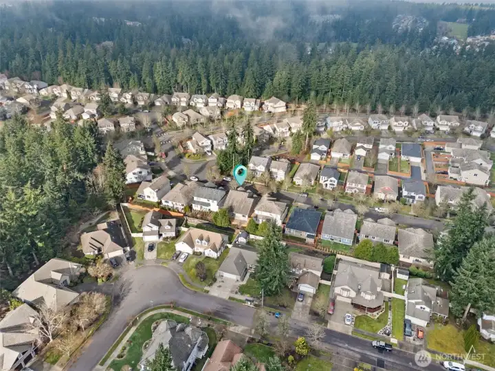 Low maintenance fans, this one’s for you. The fully fenced backyard skips the grass in favor of an expansive paver patio, creating usable outdoor space without the upkeep. A slight slope leads to the fence line, keeping things practical and polished. It’s private, clean, and designed for relaxing, not landscaping.