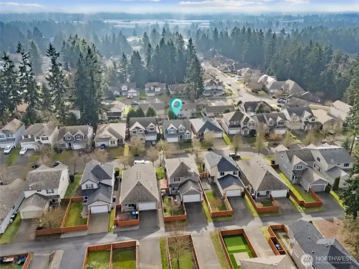 This aerial shows the full stretch of Campus Meadows and why people like living here. Clean streets, consistent curb appeal, and a neighborhood that feels settled without feeling sleepy. Location adds real lifestyle value too, with five parks within eight miles, including Nisqually Reach Nature Center, Nisqually National Wildlife Refuge, and Tolmie State Park. Whether it’s trails, waterfront views, bird watching, or just space to breathe, this is a neighborhood that connects everyday living with the outdoors.