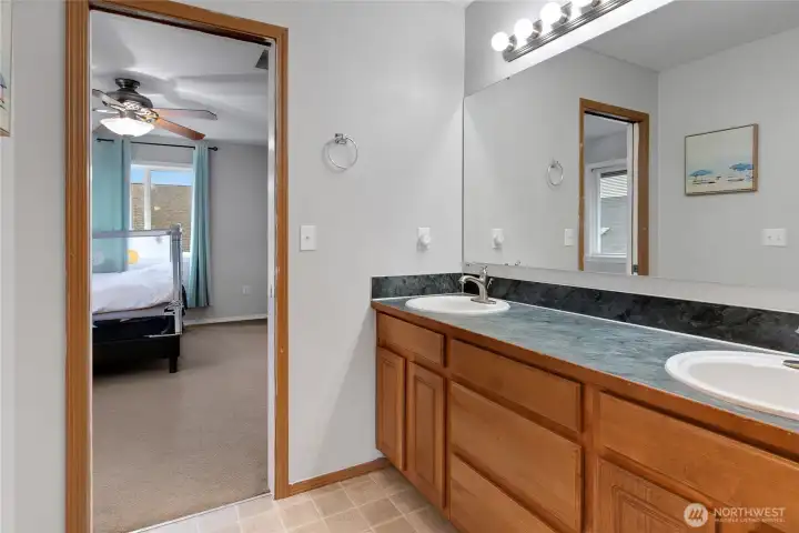Perfectly positioned between two spacious bedrooms, the Jack-and-Jill bath creates an ideal balance of independence and connection — practical for busy mornings and peaceful evenings alike.