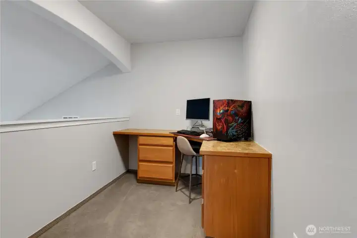 A built-in desk creates the perfect tucked-away workspace — ideal for remote work, study sessions, or creative projects.