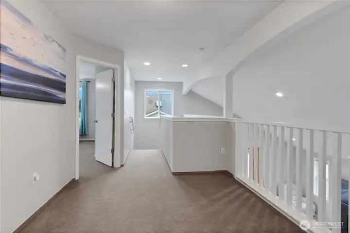 The open loft creates an elevated extension of the home’s living space—ideal as a private media lounge, executive workspace, or quiet retreat. Overlooking the main level, it enhances the architectural flow while offering versatility for today’s dynamic lifestyle.