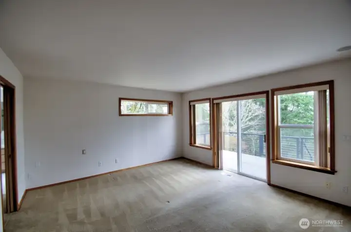 Primary suite with slider access to the updated deck and gorgeous view.  Spacious bedroom.