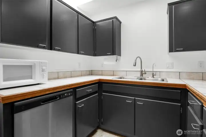 stainless steel appliances, sleek cabinets.