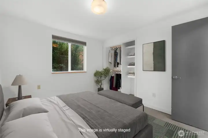 Bedroom #1. This image is virtually staged.