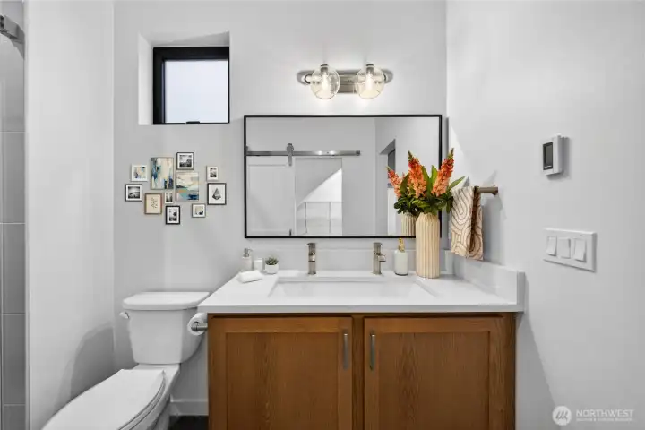 Elegant owner's suite bathroom with double sink heads.