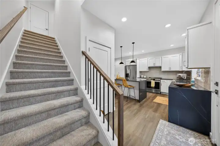 Heading upstairs to the additional two bedrooms and full bath.