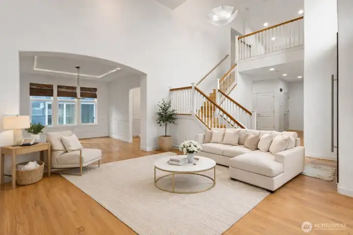 Rich solid hardwood floors & trim throughout. (virutally staged)