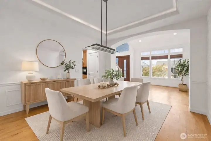 Entertain with ease in the formal dining area. (virutally staged)