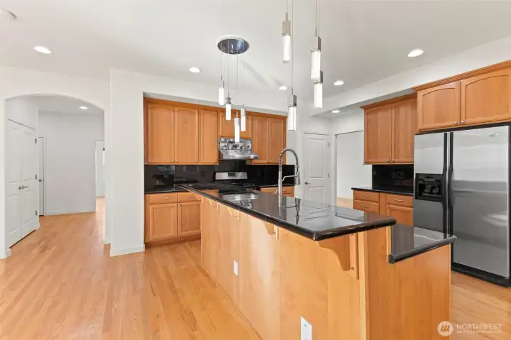 All wood cabinetry and marble countertops.