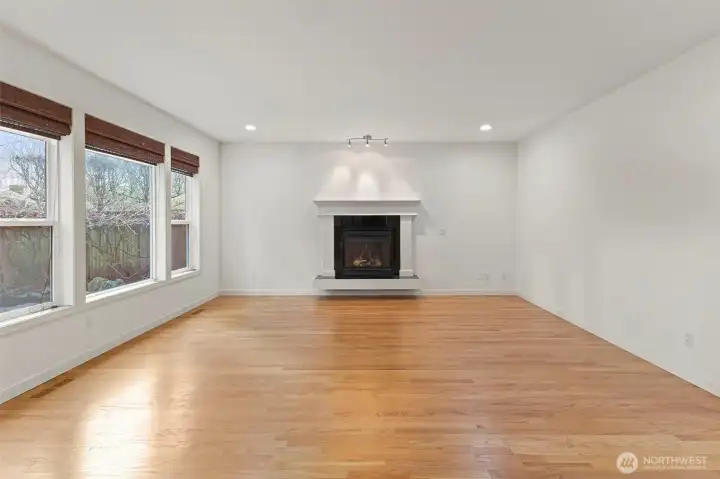 Relax in the cozy living room centered around a gas fireplace.