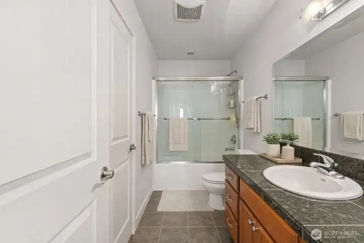Hallway full bathroom (virtually staged)