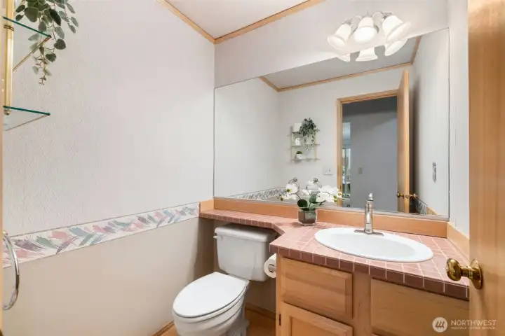 Half Bath conveniently located on the Main Floor next to the Family Room