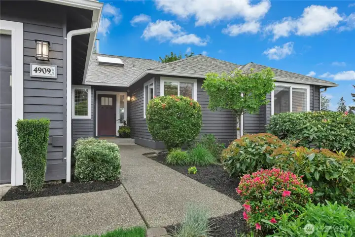 Welcoming front exterior with mature landscaping, refreshed paint, covered entry, and peaceful cul-de-sac setting in one of Renton Highlands’ most desirable neighborhoods.