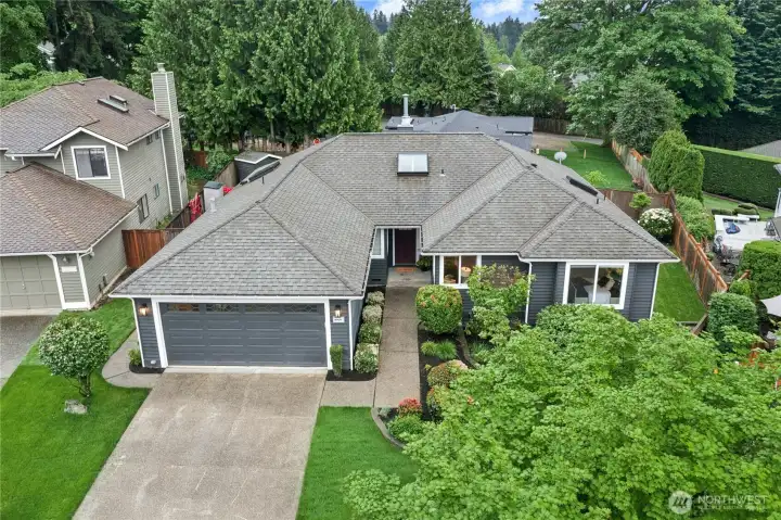 Aerial Property Overview  Bird’s-eye view highlighting the home’s spacious footprint, cul-de-sac setting, mature landscaping, and impressive lot layout.
