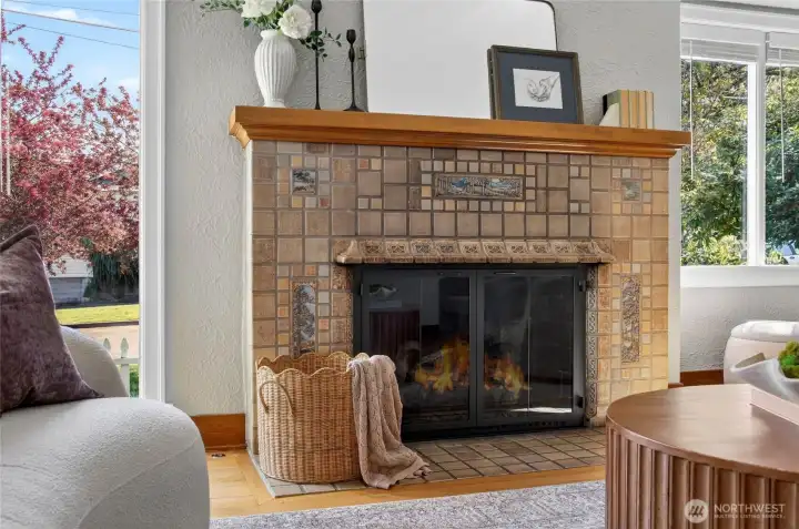 The fireplace with Batchelder Tile is in pristine condition and is one of the most beautiful period fireplaces in the area.