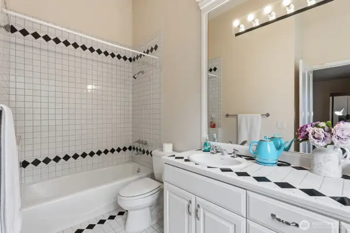 Main floor en-suite bathroom off guest room.