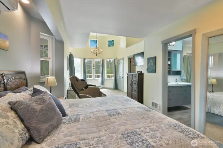 Primary suite, upper level-lots of light, vaulted ceiling and sky light with private deck access and of course stunning views