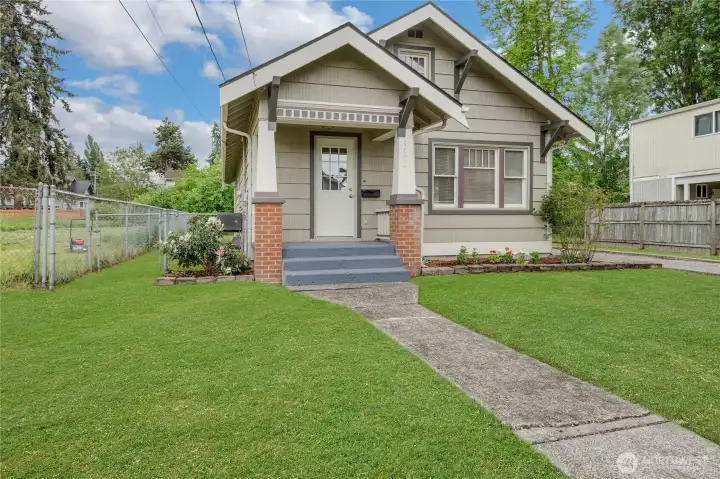 Cute 2 Bedroom Craftsman, move in ready! Grass photoshopped.
