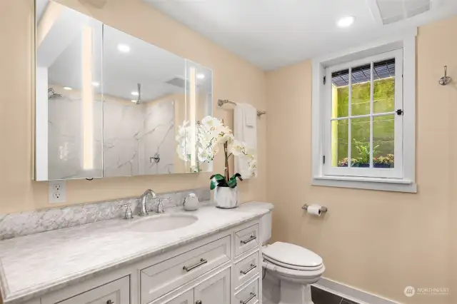 Beautiful finishes in this lower bathroom. You must see it in person to fully appreciate!