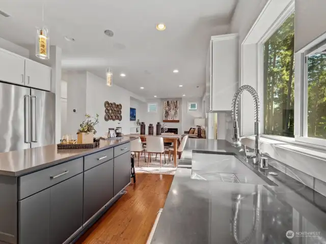 View of from kitchen to dining area to family room.