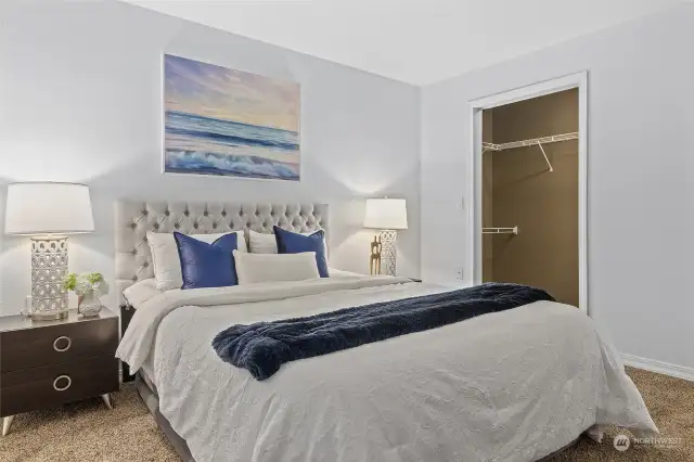 Primary bedroom showing closet.