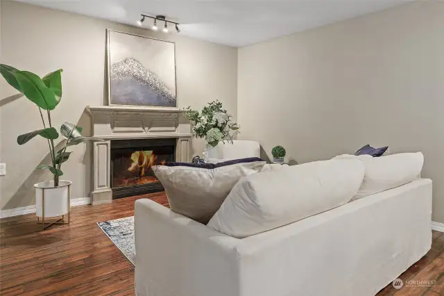 Spacious living room with fireplace.