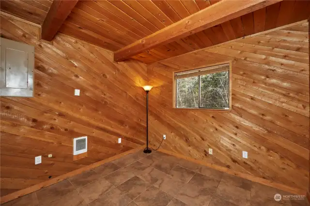 This bonus room is down stairs, which could be used as a main level primary or an office