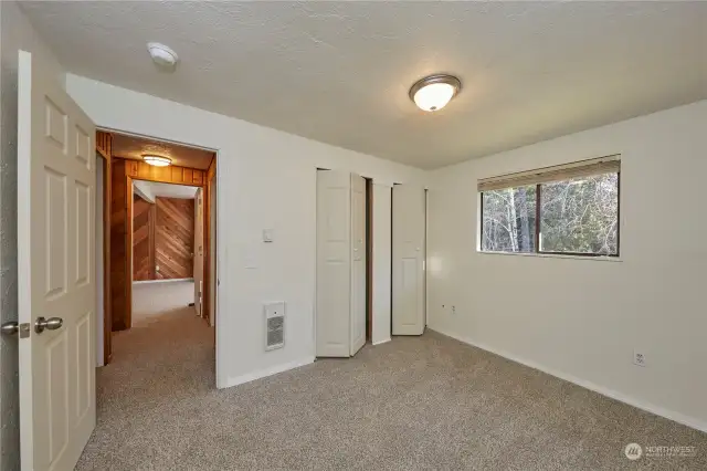 Dual bi-fold doors to access the spacious closet