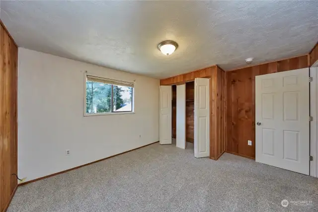 Spacious room with bi-fold closet doors