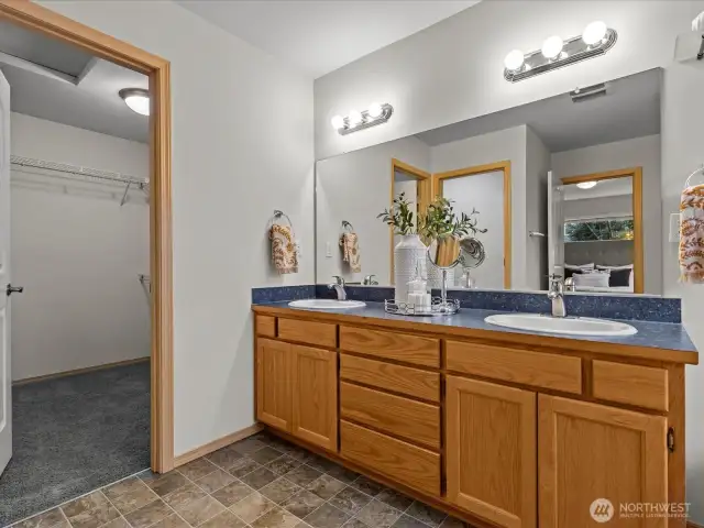 Double Sinks with Entrance to Large Walk-in Closet