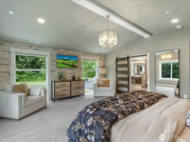 wall to wall Floor to ceiling stone accent wall and windows
