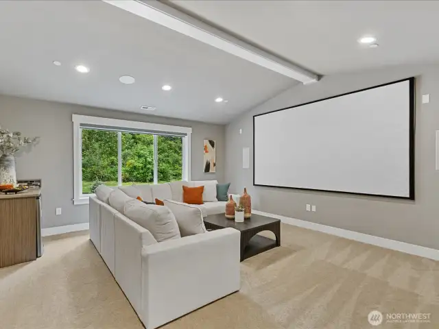 Bonus room with mini frig, projector screen, sorround sound and automated blackout shade
