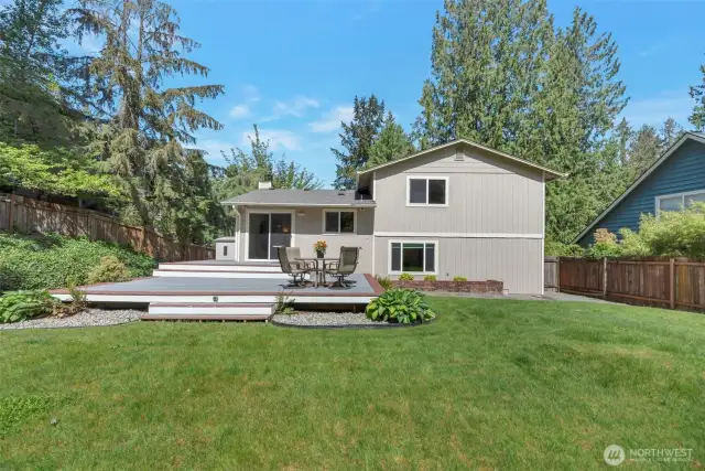 Large fenced backyard backing to greenbelt