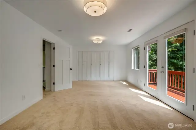 Primary Bedroom w/double doors to private deck