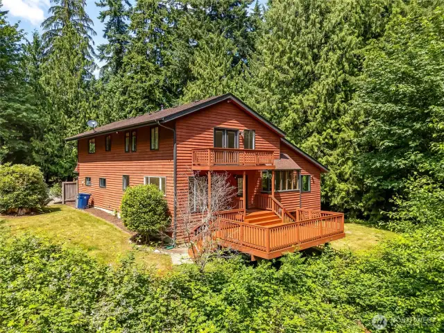 Wooded acreage surrounds this stunning home!